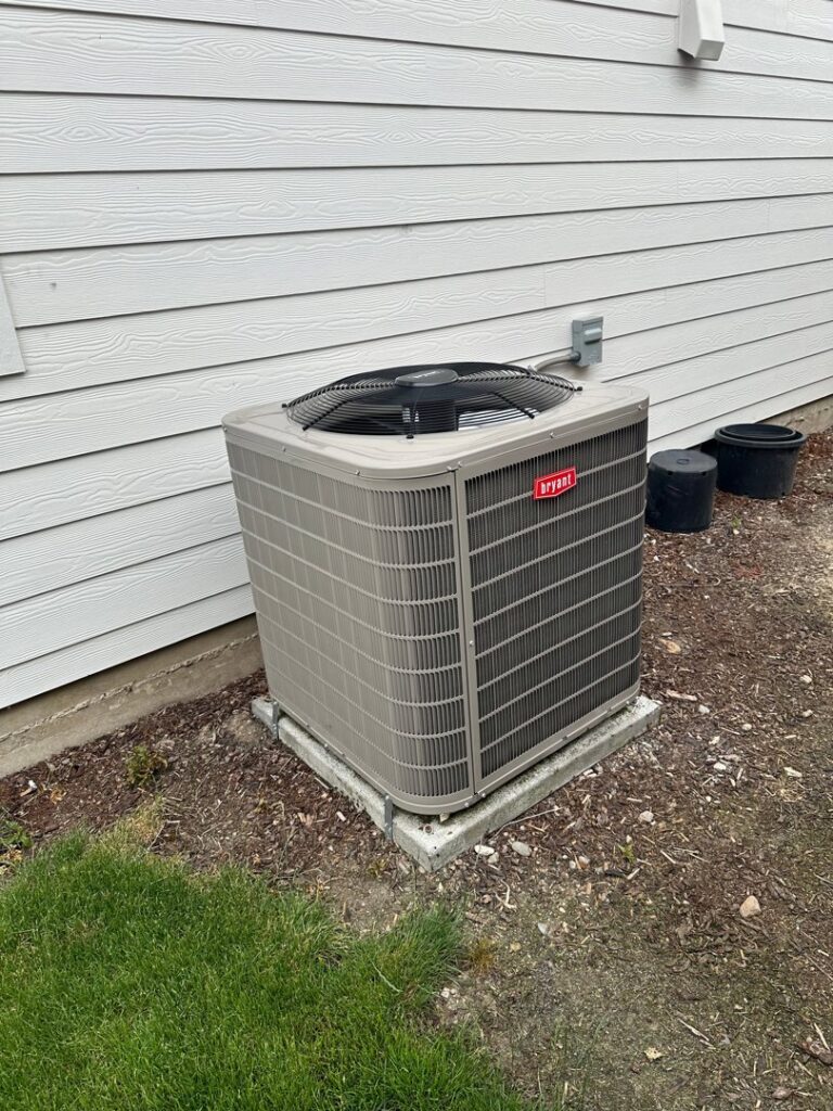 An outdoor Bryant HVAC unit installation by Allred Heating Cooling Electric in Auburn, WA.