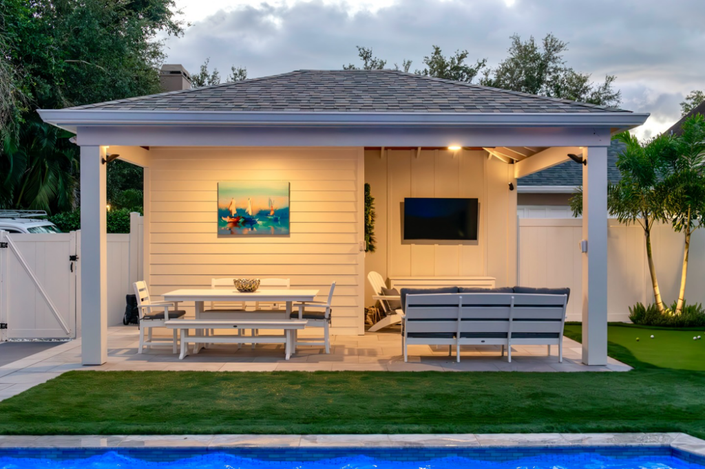 A modern outdoor cabana and pavilion built poolside by Landscape-Fusion in Tampa, FL