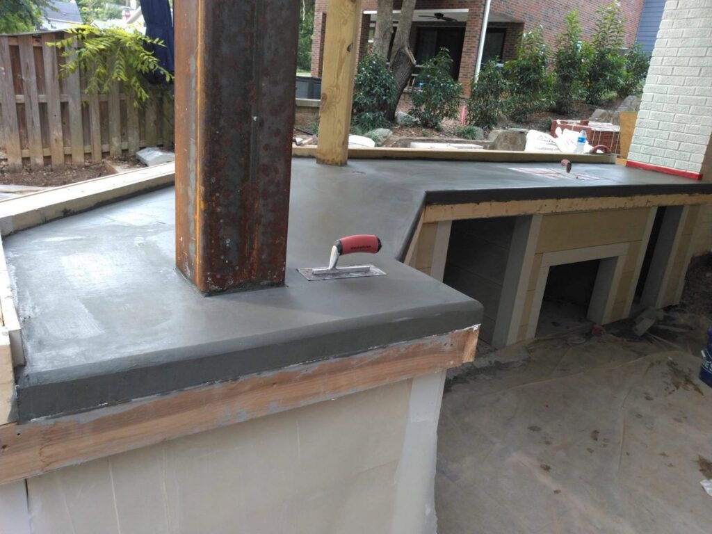 An outdoor concrete countertop or bar area under construction, showcasing custom concrete work by Rodriguez Concrete Creations in Rock Hill, SC.