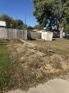 An outdoor area with debris and yard waste cleared by Clean Slate Removal in Grand Island, NE.