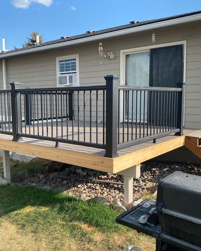 Outdoor deck and railing installation by Handyman Robert in Columbia Falls, MT.