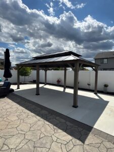Outdoor gazebo installation on a concrete patio by Panhandle Contracting Co. in Rathdrum, ID