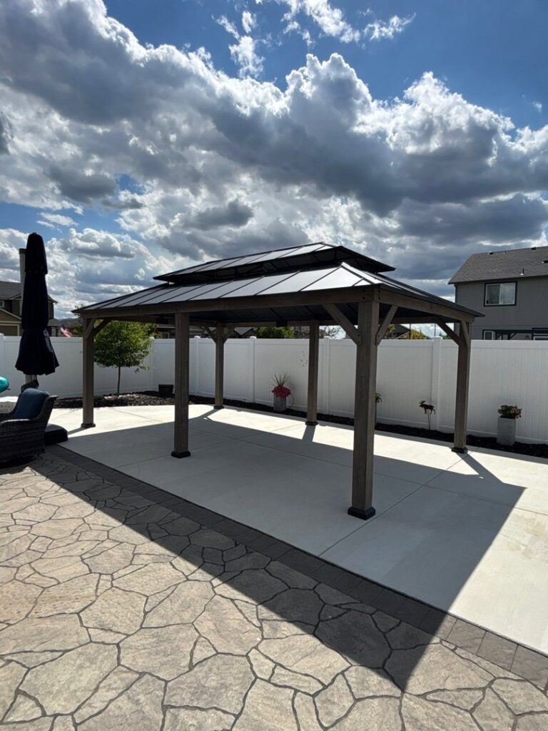Outdoor gazebo installation on a concrete patio by Panhandle Contracting Co. in Rathdrum, ID