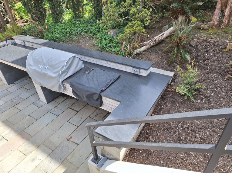 An outdoor grill and countertop area on a patio installed by Eagle Outdoor Living LLC in Freeland, WA.