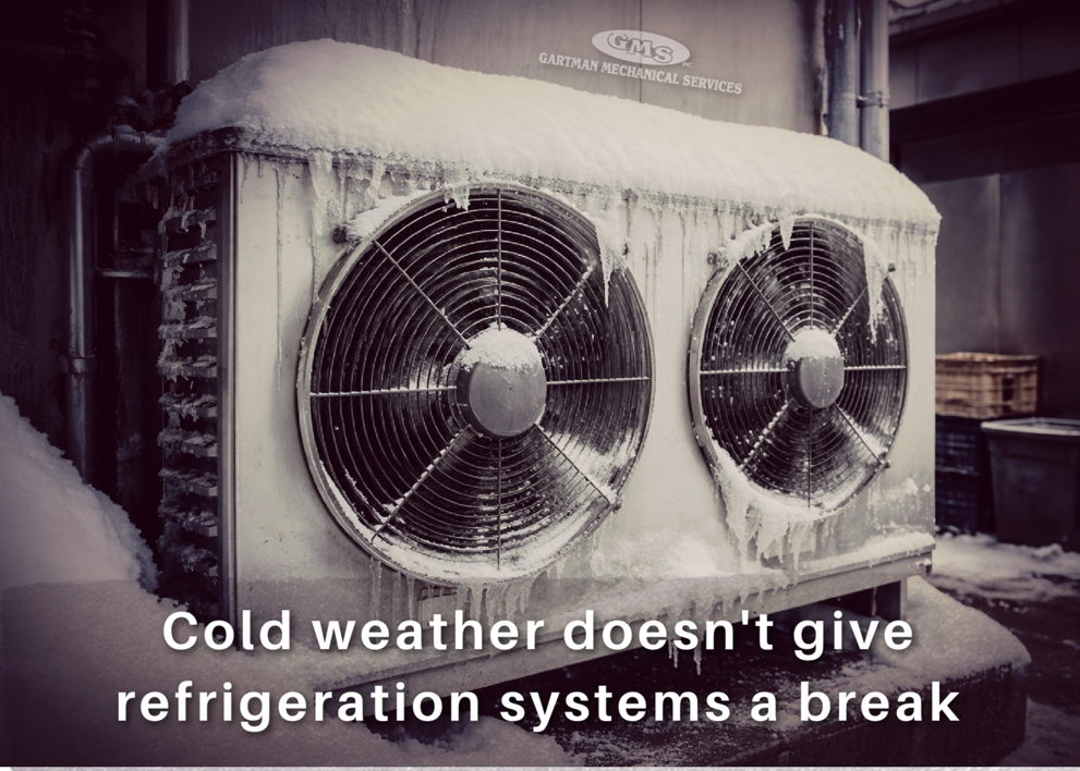 An outdoor HVAC or refrigeration unit covered in snow and ice, requiring service from Gartman Mechanical Services inc. in Oshkosh, WI.