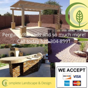 Outdoor kitchen, pergola, and paved patio installation by Stunning Pools and Spas-Complete Landscape & Design LLC in Tucson, AZ.