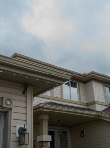 A house exterior showcasing newly installed permanent outdoor lighting by Lux Outdoor Smart Lighting in Bend, OR.