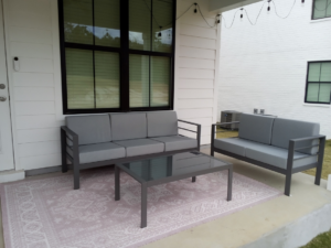 Outdoor patio furniture assembly and string light installation by Berryhill Handyman and Home Preservation in Jonesboro, AR.