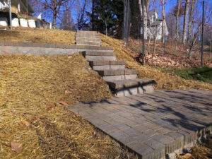Newly installed outdoor stone steps leading up a slope, completed by Landscape By Today in Bowie, MD.