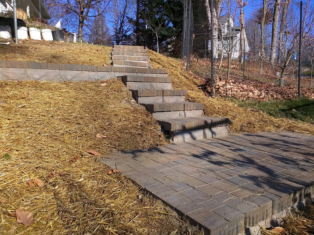 Newly installed outdoor stone steps leading up a slope, completed by Landscape By Today in Bowie, MD.
