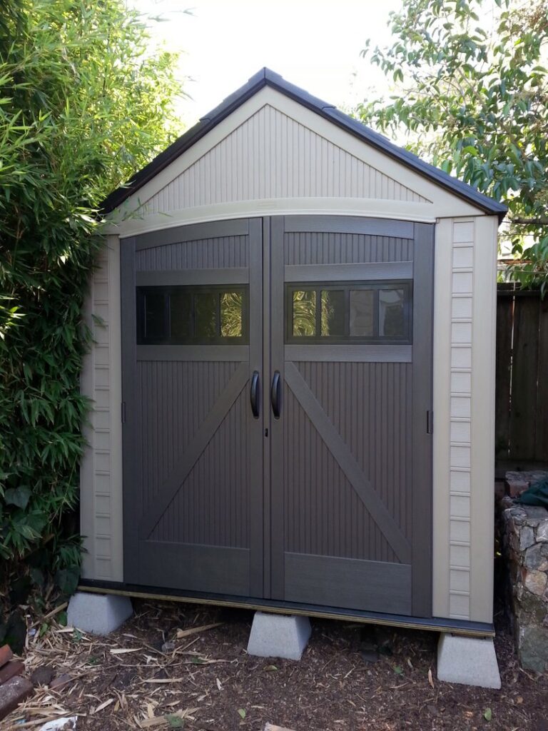 A newly assembled outdoor storage shed with double doors by Barry's Handyman Service, serving San Diego, CA.