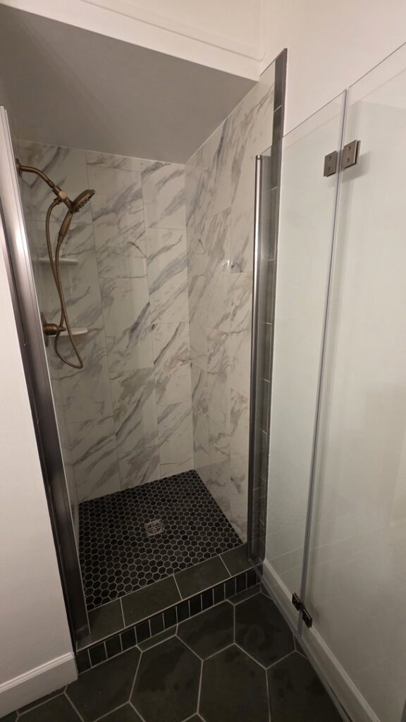 A newly constructed outdoor storage shed with a gambrel roof by VDO. Remodeling in Rancho Cordova, CA.