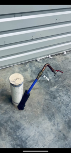 An outdoor water spigot and piping installation by The General Handyman in Los Angeles, CA.