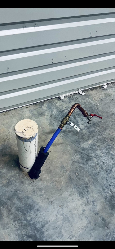 An outdoor water spigot and piping installation by The General Handyman in Los Angeles, CA.