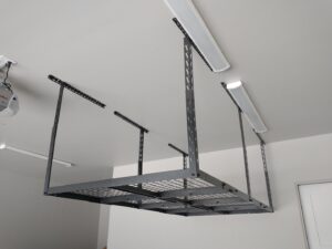 A sturdy overhead garage storage rack professionally installed on the ceiling by Boise Handyman & Remodel in Boise, ID.