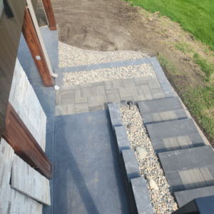 Overhead view of a newly installed paver walkway and patio by Great Plains Remodeling and Handyman Services in Mitchell, SD.