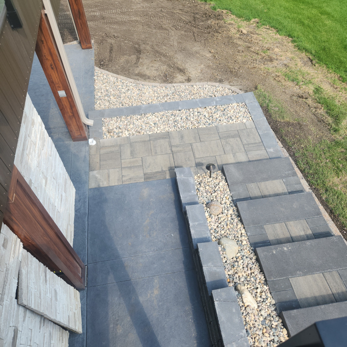 Overhead view of a newly installed paver walkway and patio by Great Plains Remodeling and Handyman Services in Mitchell, SD.