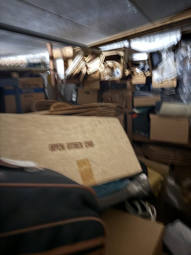 An overstuffed storage room packed with boxes and items, ready for a cleanout service by Altri Junk Removal Services in Lynn, MA.