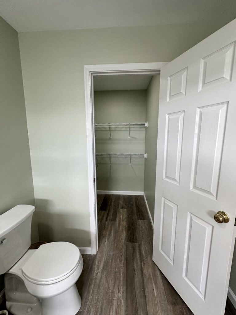 A small pantry or closet with new wire shelving and flooring, installed by Lynden Remodeling in Cincinnati, OH