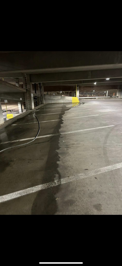 A parking garage floor cleaning project underway by RWD Construction in San Antonio, TX.