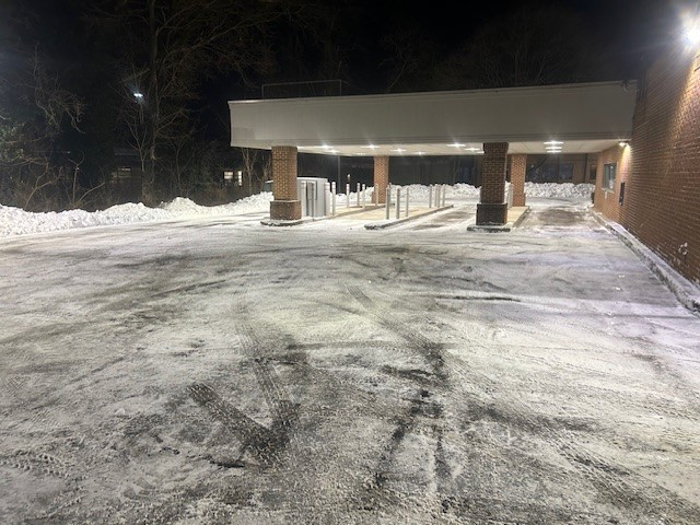 A cleared parking lot and drive-thru area after snow removal by East Coast Services LLC in Baltimore, MD.