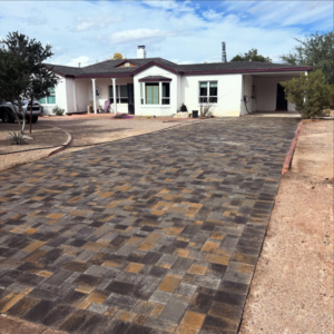 A newly installed multi-colored paved driveway by Oakswood Turf and Hardscape in Tucson, AZ