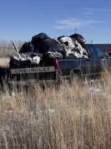 A pickup truck overflowing with garbage bags and debris, collected by Jedi Junk Removal Garbage Services Pocatello, ID.