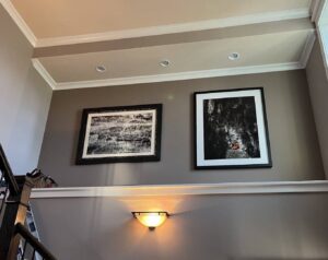Professionally hung pictures and newly installed crown molding by Triple M Handyman in Portsmouth, NH.