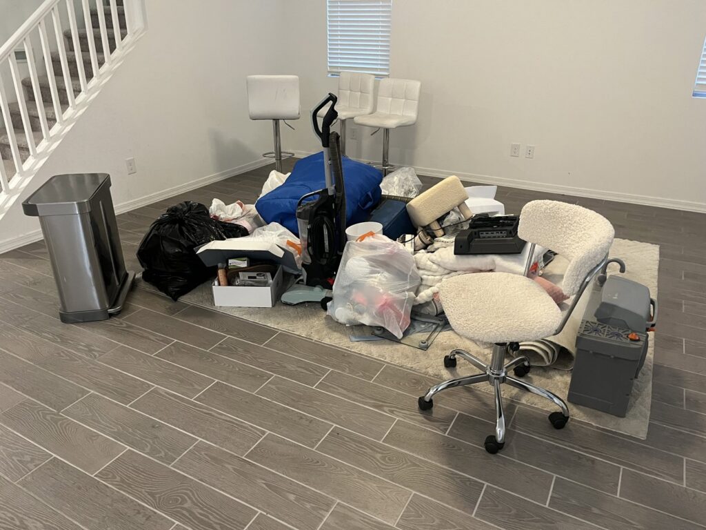 A pile of household junk items ready for removal by Happy Hippo Junk Removal in Scottsdale, AZ.