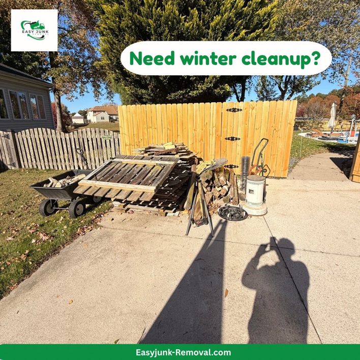 A pile of wooden pallets and yard debris in a driveway, ready for cleanup by Easy junk removal in Newport News, VA.