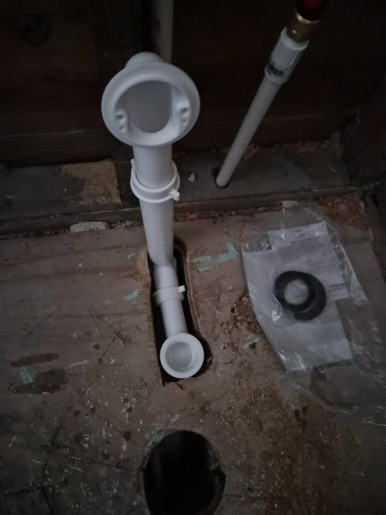 Close-up of new plumbing drain pipe installation by Handyman Service in Lafayette, IN.
