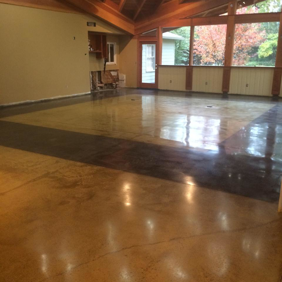 A newly polished concrete floor in a large room undergoing renovation by Kentucky Decorative Concrete in Nicholasville, KY.