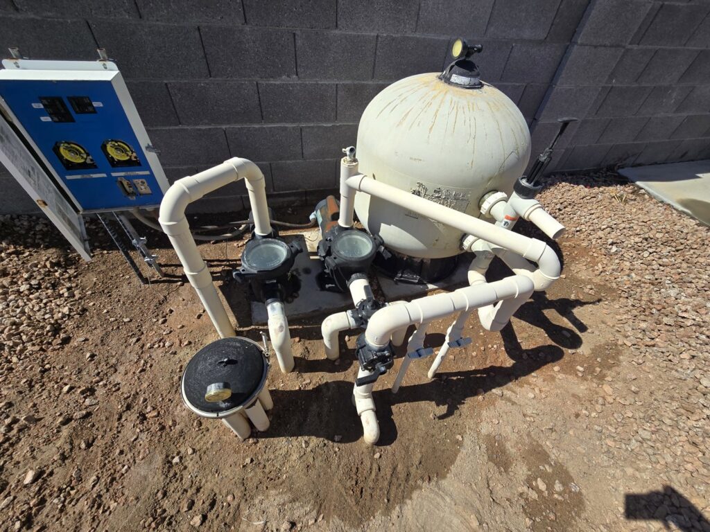 A pool under construction with rebar and plumbing visible, showcasing work by Aqua Squad Pools & Landscaping in Gilbert, AZ.