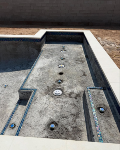 Pool interior showing mosaic tiles installed before plastering by Prado & Sons Pool Plastering, Inc. in Glendale, AZ.