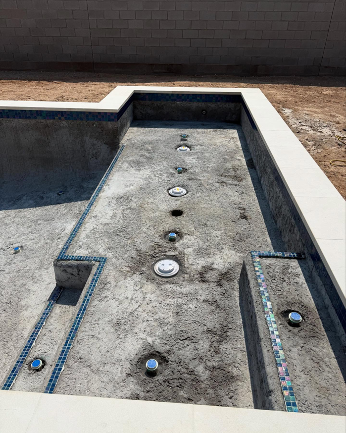 Pool interior showing mosaic tiles installed before plastering by Prado & Sons Pool Plastering, Inc. in Glendale, AZ.