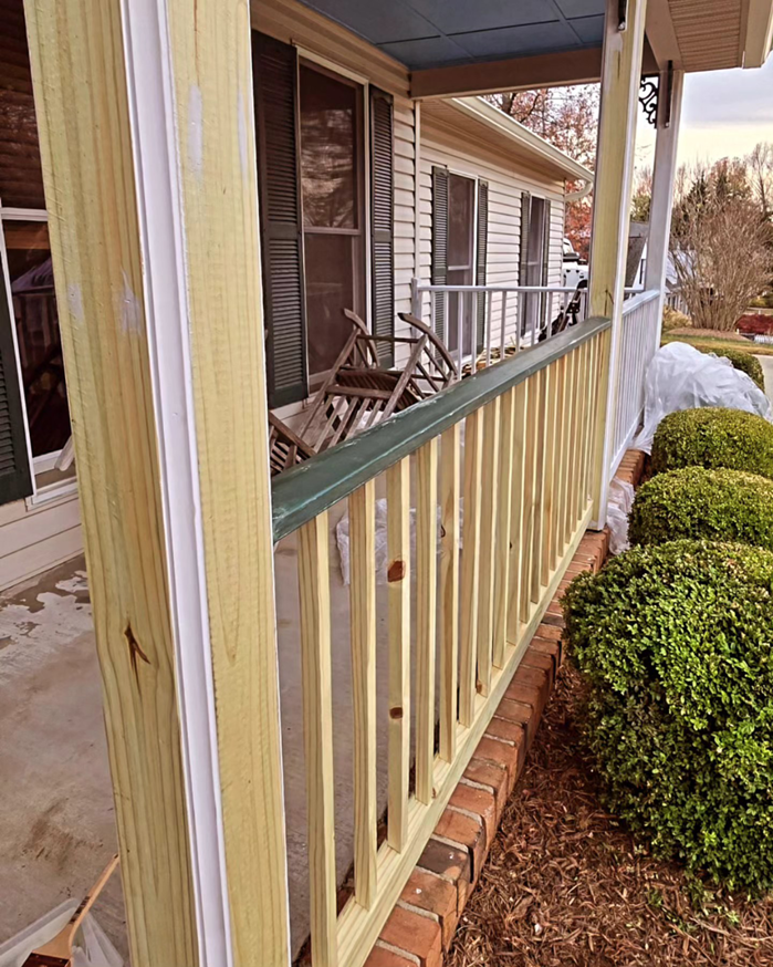 A porch railing replacement and repair project in progress, demonstrating services by DEMIA 17 & Company LLC in Waldorf, MD.