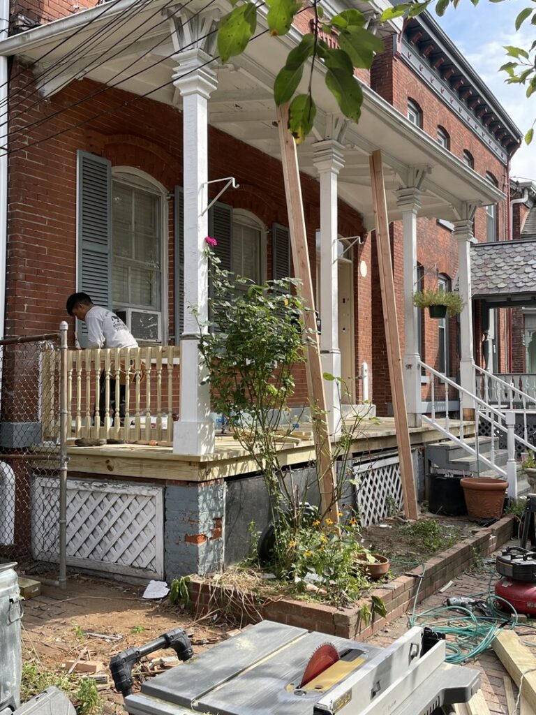 Porch renovation and construction in progress on a brick house by JAC Home Improvement LLC in Danbury, CT.