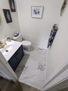 Completed powder room renovation by My Handyman of Wichita KS, serving homes in Kechi, KS.
