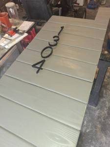 Wooden planks being prepared for a custom mailbox post by American Renovation Llc in Fairplay, SC.