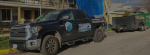 A Pro DK Contractor LLC truck and trailer parked at a construction site in Chicago, IL.