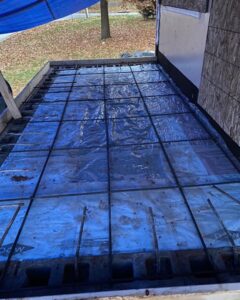 Rebar grid laid out for a concrete foundation or slab, part of a construction project by MCG General Contractor in Philadelphia, PA.