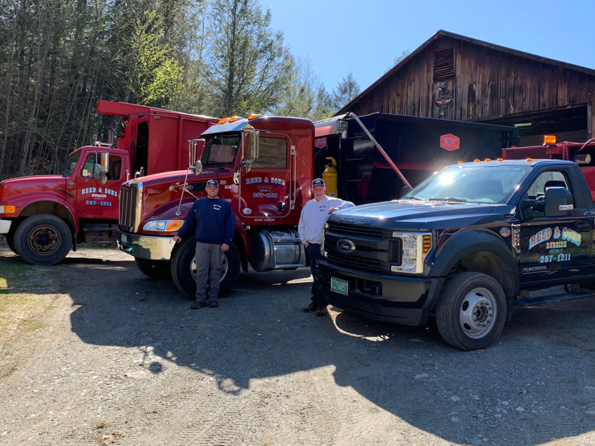 The Reed & Sons Rubbish team with their fleet of junk removal trucks, ready for service in Guilford, VT.