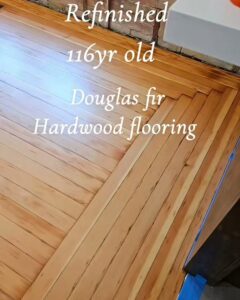 Close-up of beautifully refinished 116-year-old Douglas fir hardwood flooring by Quick Sand Flooring & Install LLC in Millcreek, UT.