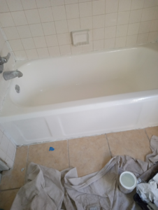 A freshly refinished white bathtub, showcasing a completed handyman project by Charles and Drew Project Page in Detroit, MI.