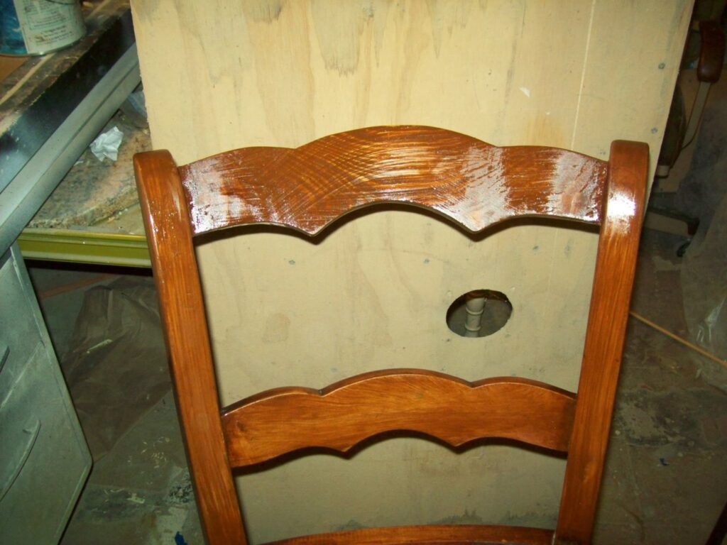 A beautifully refinished wooden chair back, showcasing the craftsmanship of Custom Carpentry Service in Knoxville, TN.