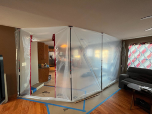 A remodeling project in progress with a dust barrier installed by Silhouette Builders, Inc. in Yorkville, IL