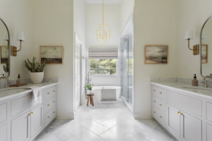 A beautifully renovated bathroom with new vanities and a freestanding tub by ADAMS Pro Finish in Spring Hill, TN.