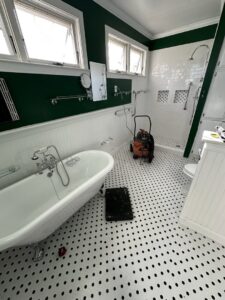 Renovated bathroom featuring a clawfoot tub and subway tile shower by KG Handyman & Remodeling in Vilonia, AR.