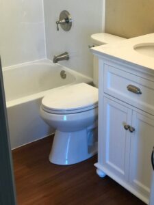 A renovated bathroom featuring a new bathtub and shower area completed by Bath Planet of STL & More in Saint Charles, MO.