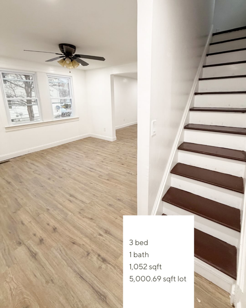 A renovated home interior featuring new flooring and a staircase, completed by I Revive Homes in Edison, NJ.
